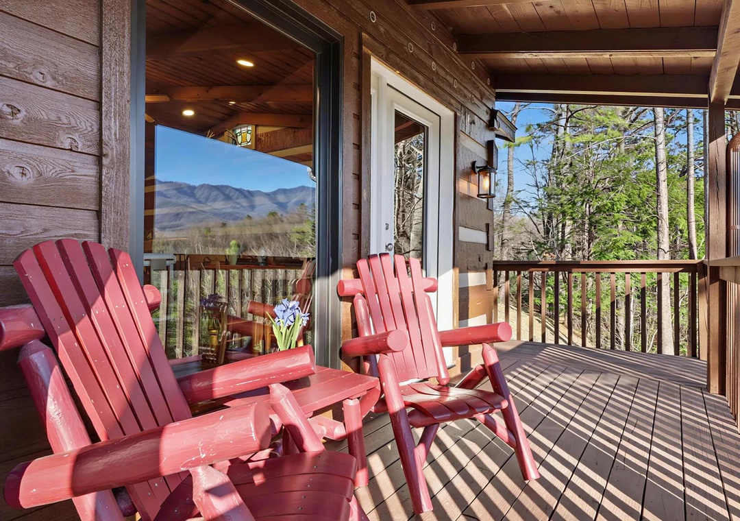 Relax in cozy Adirondack chairs as you take in stunning mountain vistas. Your private deck offers the perfect spot to unwind and soak up the peaceful scenery.