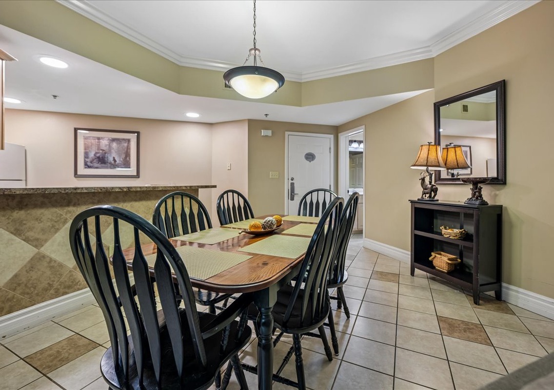 Gather around your spacious dining table for memorable meals with family and friends in this welcoming space.