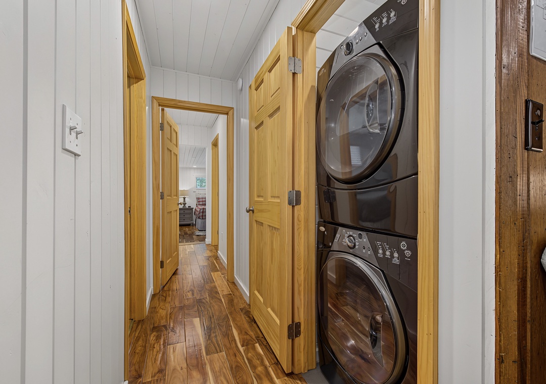 Your laundry routine becomes effortless with a stacked washer and dryer tucked neatly in a hallway closet—stay refreshed without leaving the comfort of your rental.