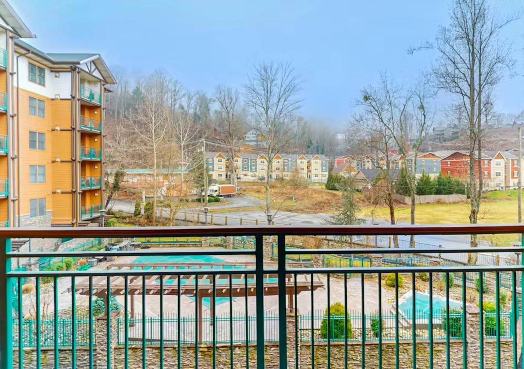 Sweeping views from your private balcony showcase the resort's aqua park below and mountain community beyond.