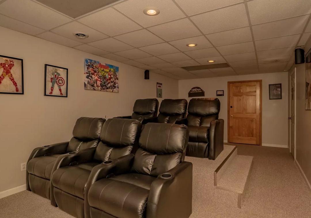 Sink into luxurious leather recliners in your private home theater, where movie nights become unforgettable experiences with stadium seating and surround sound.