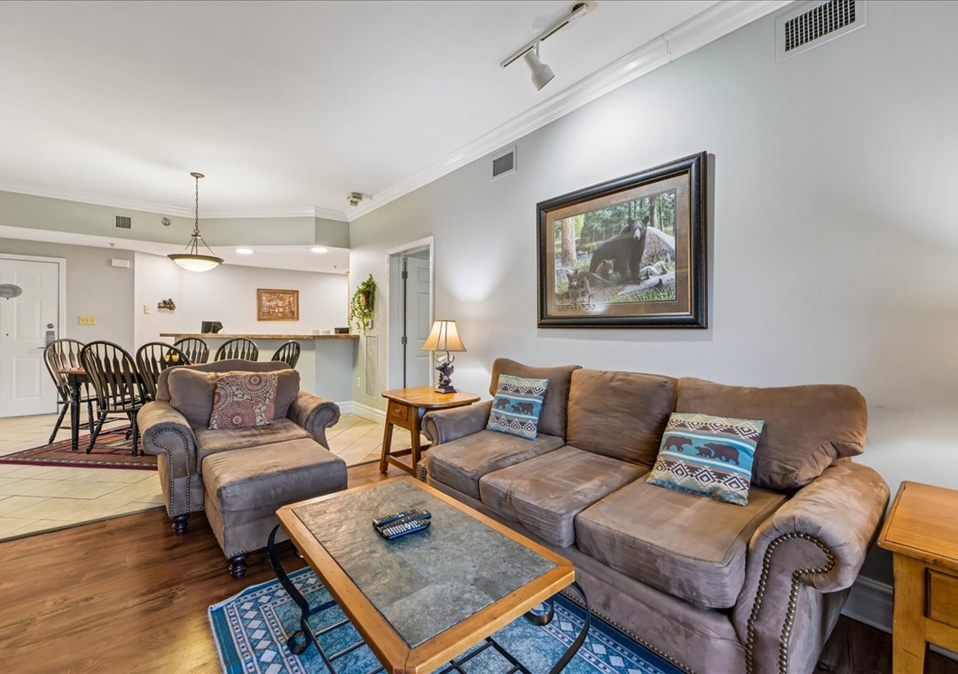 Sink into plush sofas with southwestern pillows while you plan your next adventure in this open, airy living space.