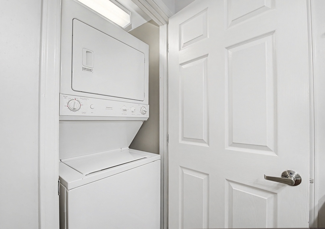 Your dedicated laundry closet features a convenient stacked washer and dryer, making it easy to keep your clothes fresh during your stay.