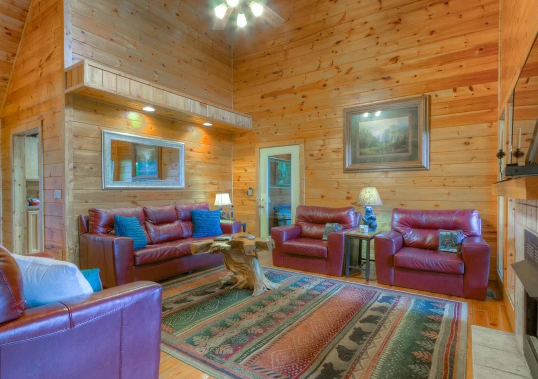 Step into your cozy cabin retreat with warm pine walls and plush leather seating. Sink into these comfortable chairs as natural wood surrounds you, creating the perfect mountain getaway atmosphere.