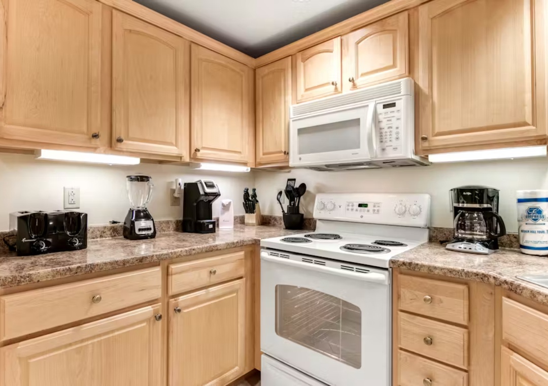 Your fully equipped kitchen features granite counters, modern appliances, and everything you need to cook delicious meals during your stay.