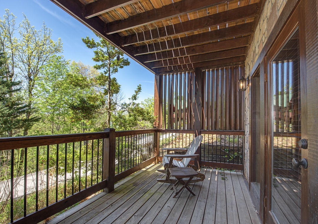 Unwind on your private covered deck with garden views, where morning coffee tastes better surrounded by nature's tranquility.