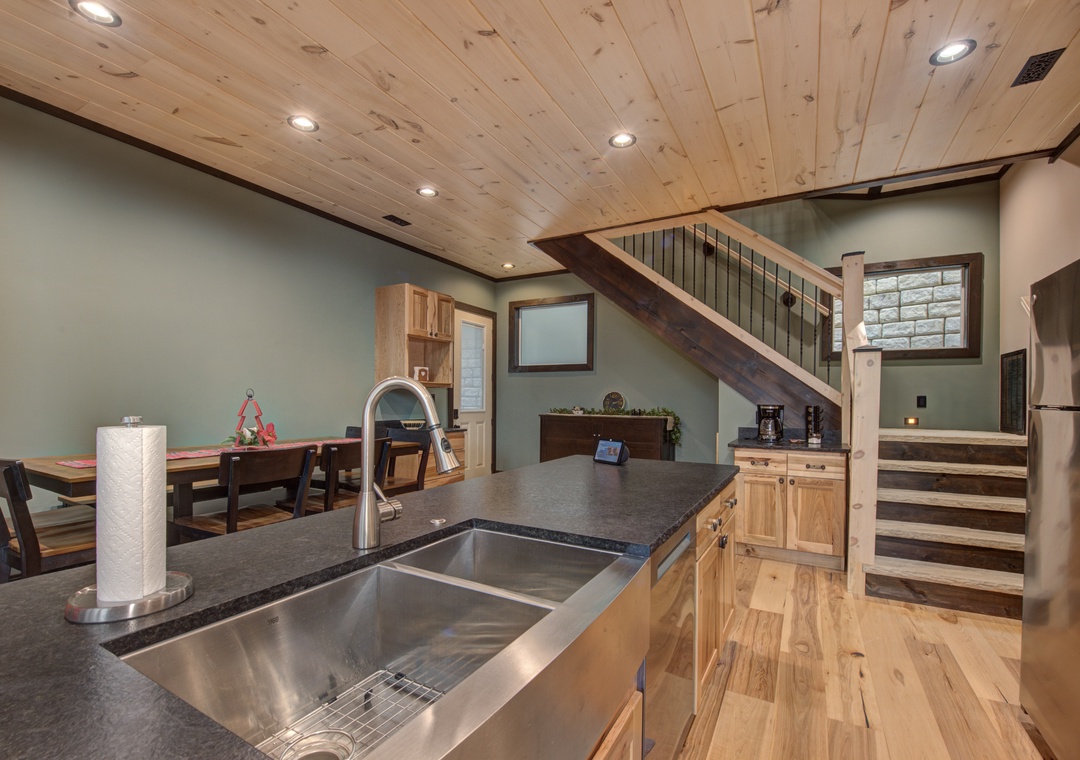 Your fully equipped kitchen features granite counters, stainless appliances, and an open design perfect for cooking and gathering.