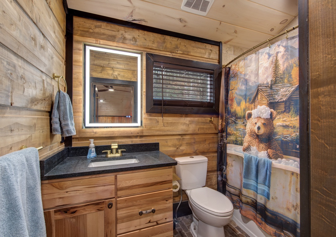 Immerse yourself in rustic charm with warm wood details, artistic touches, and thoughtful amenities for your mountain retreat.