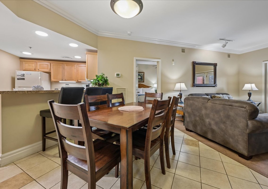 Gather around your spacious dining table where wood warmth meets modern comfort, perfect for sharing meals and making memories together.