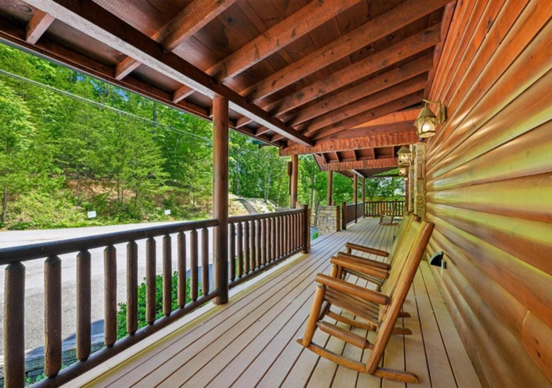 Settle into your rocking chair on this covered deck, where tall trees and fresh mountain air create the perfect spot for your morning coffee or evening unwind.