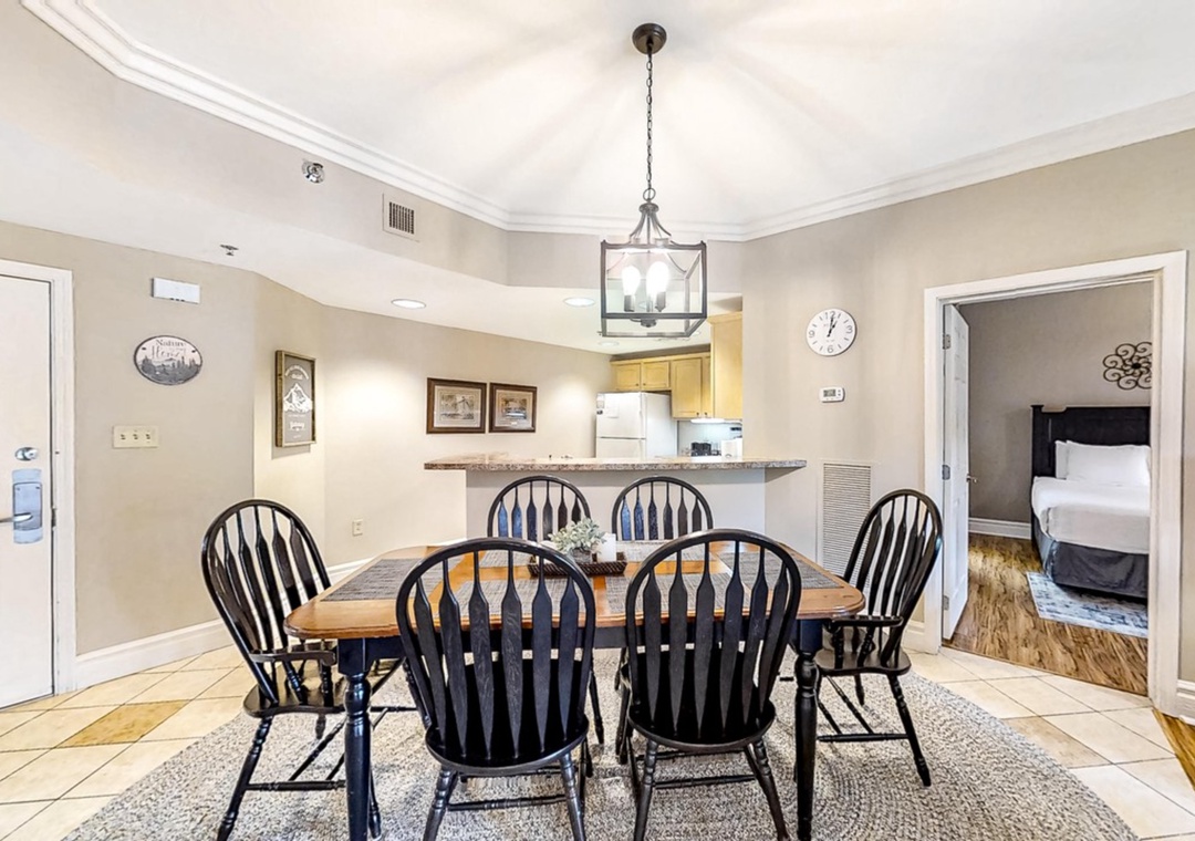 Gather around your spacious dining table for memorable meals, with the open kitchen making it easy to serve and socialize together.