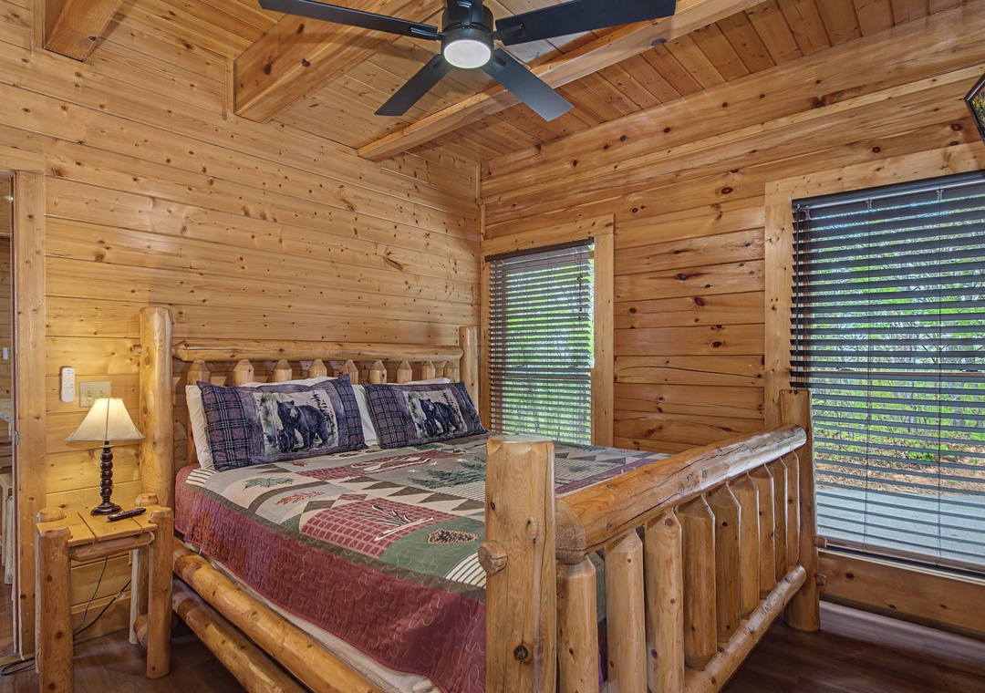 Drift off to sleep in your cozy log cabin bedroom, where rustic charm meets comfort with handcrafted wooden furnishings.