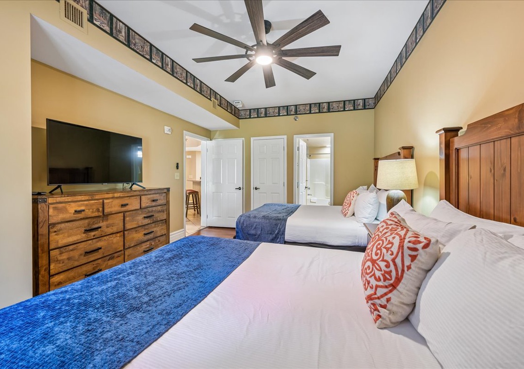 Drift into peaceful sleep on plush beds with crisp linens, while overhead fans keep you cool and cozy in your rustic-chic retreat.