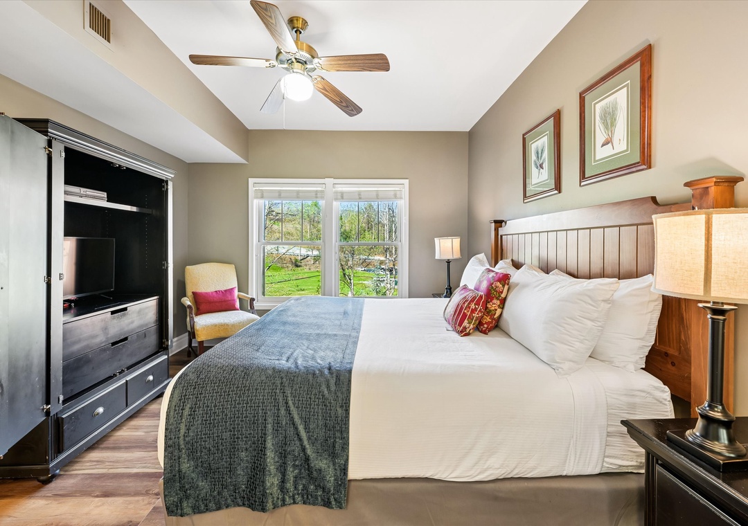 Wake up refreshed in your serene bedroom with garden views and cozy linens that promise a perfect night's sleep.