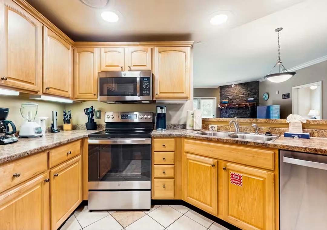 Your fully equipped kitchen awaits with granite counters, stainless appliances, and everything needed to create delicious meals during your stay.