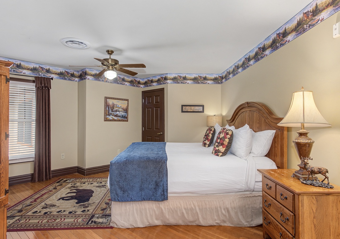 Sink into your comfortable king bed surrounded by charming rustic décor and warm wood furnishings for the perfect mountain getaway retreat.