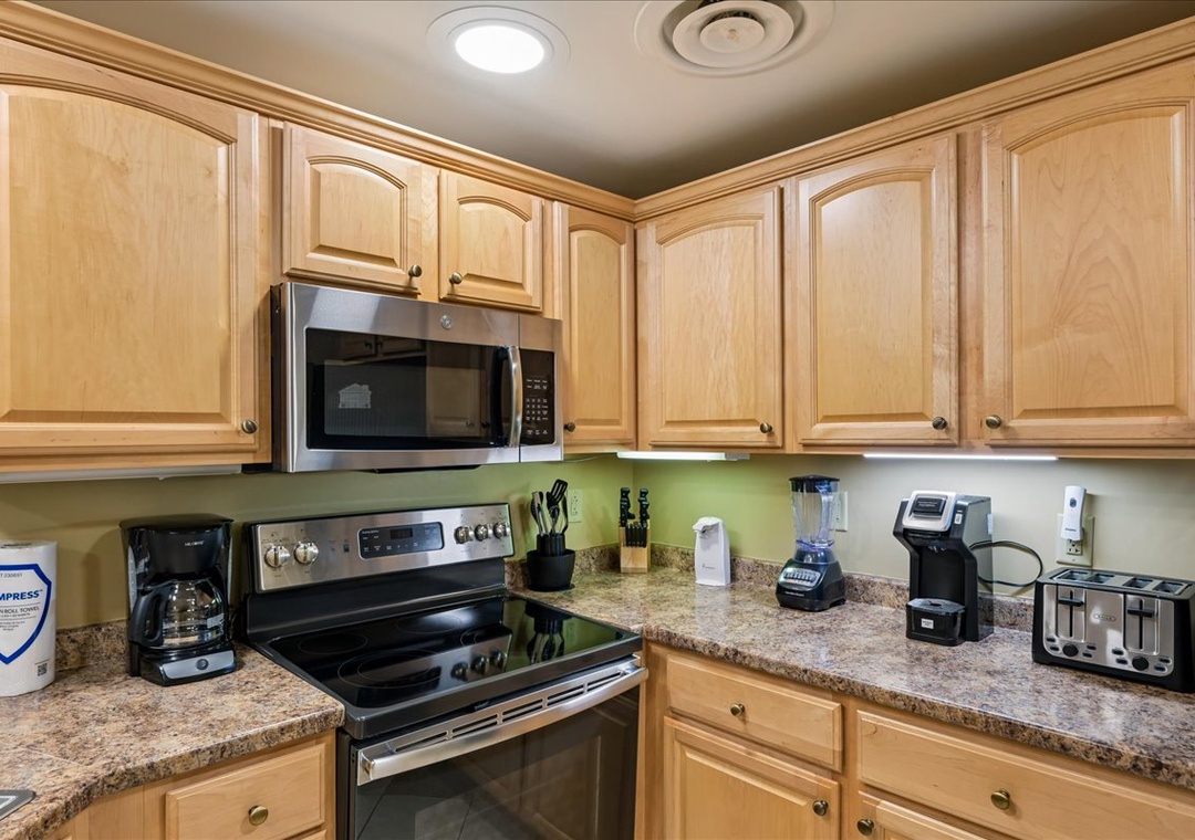 Your fully equipped kitchen awaits with granite countertops, stainless steel appliances, and everything you need to create memorable meals during your stay.