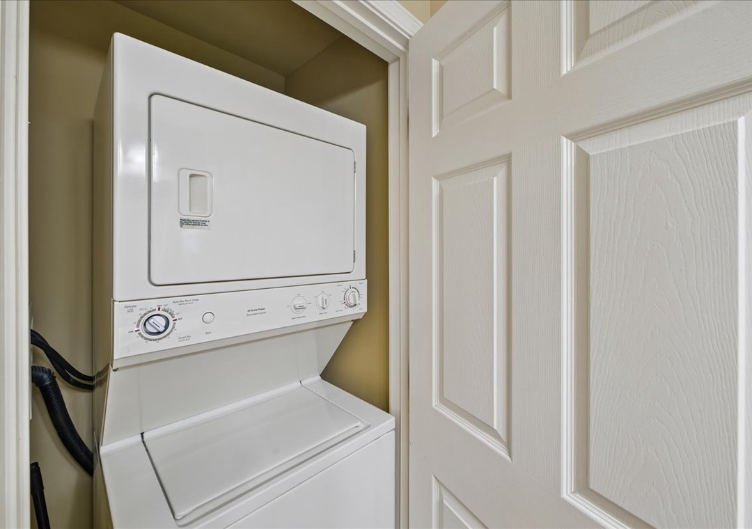 Your own stacked washer and dryer tucked away in a convenient closet, making longer stays effortlessly comfortable.