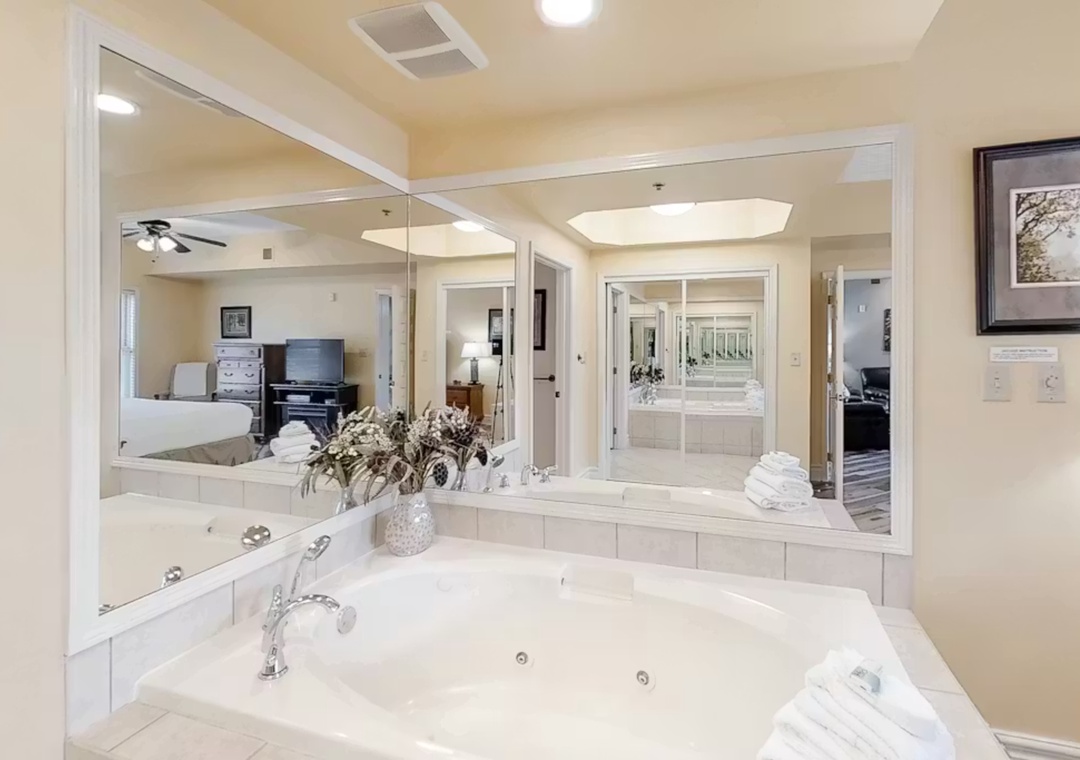 Unwind in your spacious master bathroom featuring a luxurious jetted tub, perfect for soaking away the day's adventures.