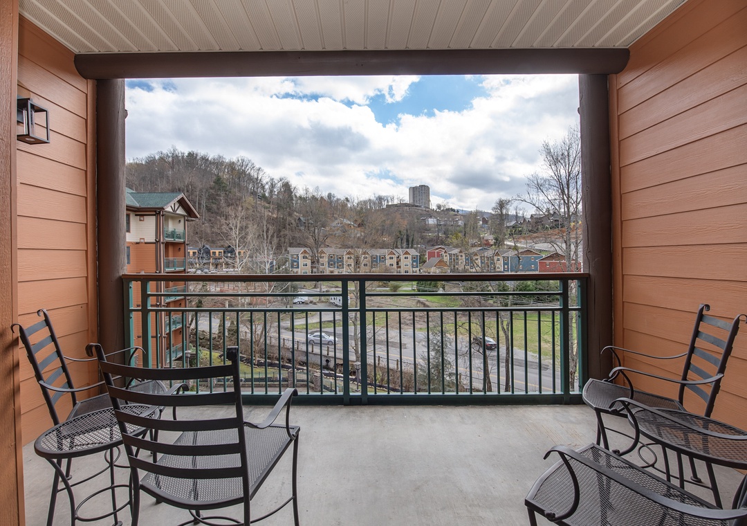 Unwind on your private balcony with comfortable seating and stunning views of the scenic riverside landscape.