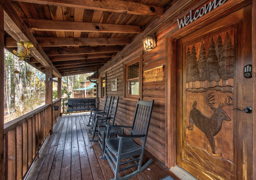 Your private covered porch features handcrafted rocking chairs where you can unwind while taking in peaceful forest views.