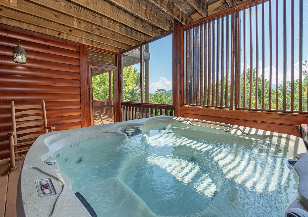 Soak in your private hot tub while taking in sweeping mountain views framed by natural wood and rustic metal accents—pure relaxation awaits.