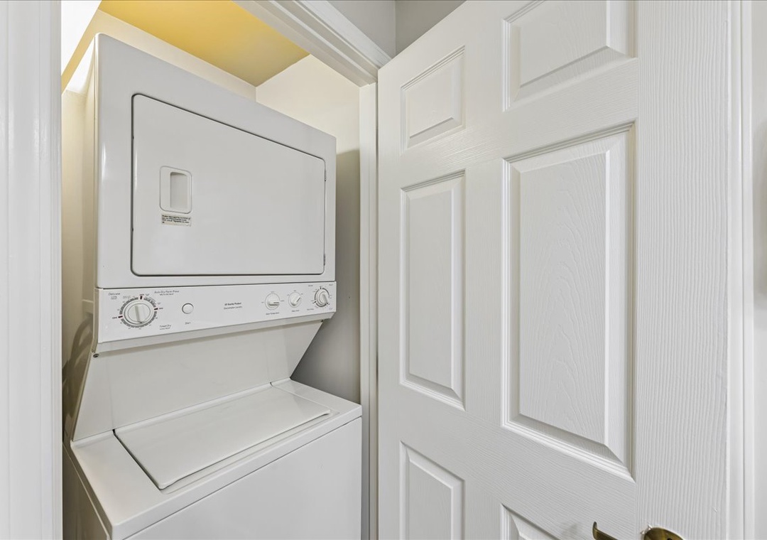 Your own stackable washer and dryer tucked behind elegant doors makes packing light effortless for your stay.