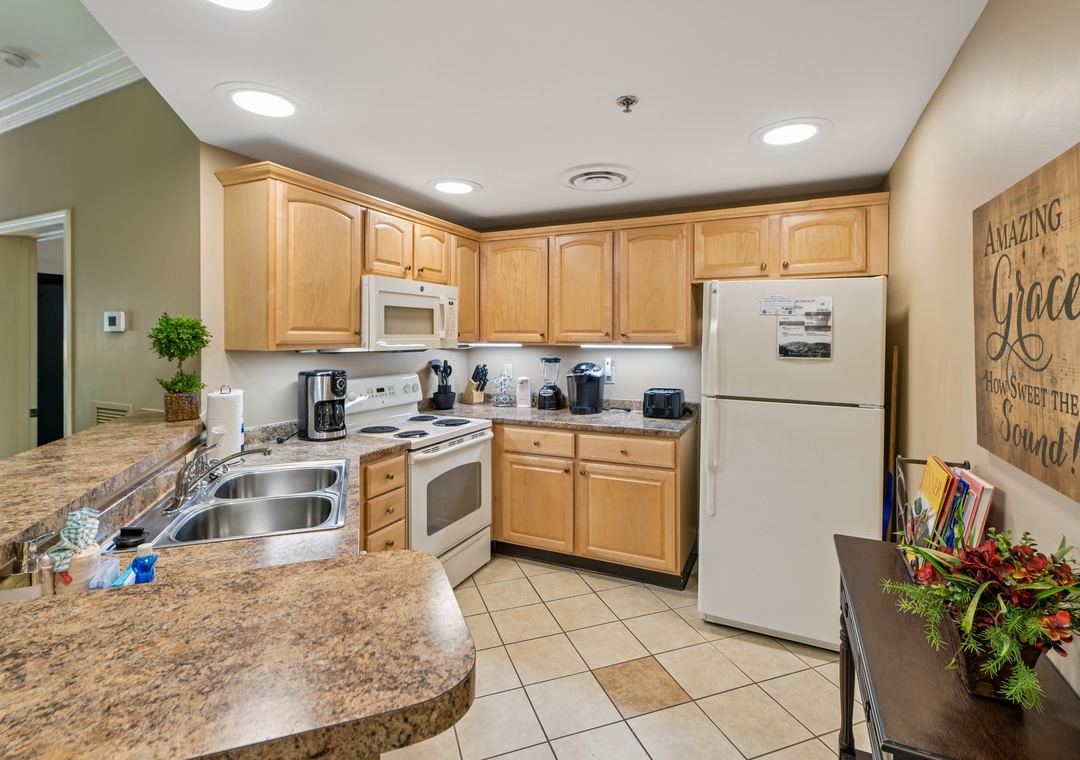 Your fully equipped kitchen features granite countertops, stainless steel appliances, and all the essentials for preparing delicious meals during your stay.