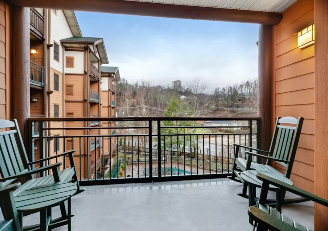 Unwind on your private covered balcony with comfortable seating while taking in peaceful views of the surrounding landscape.