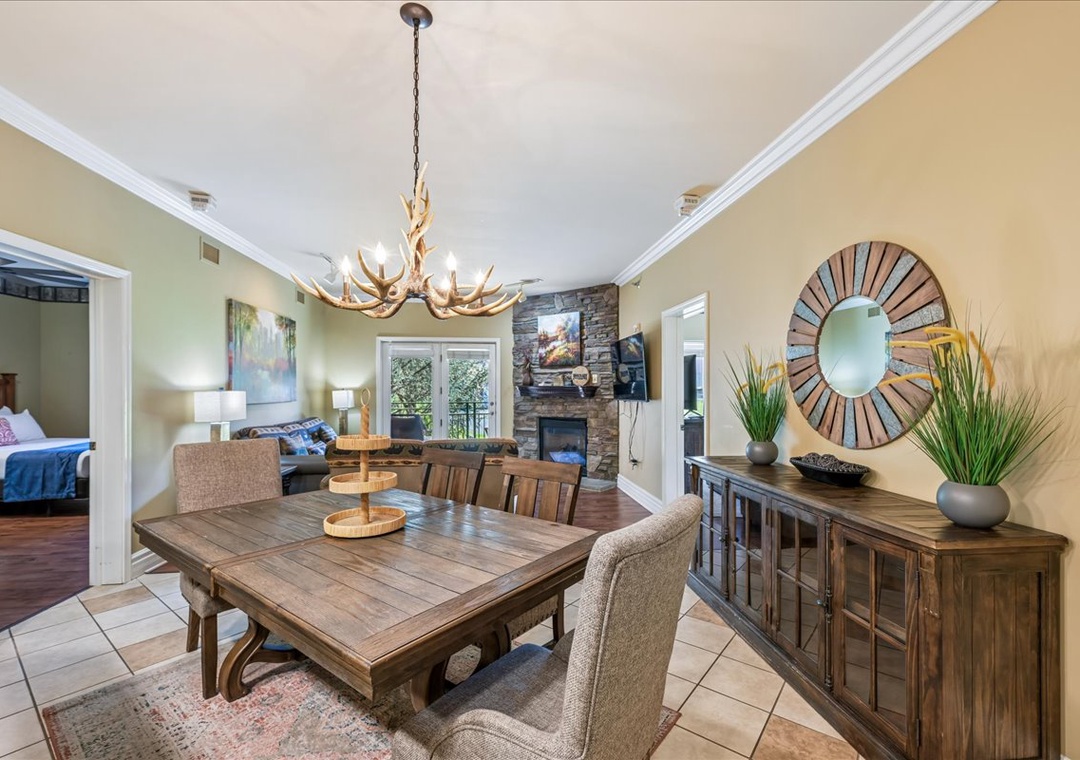 Gather around your elegant dining table for memorable meals, with the cozy living room and fireplace just steps away for post-dinner relaxation.