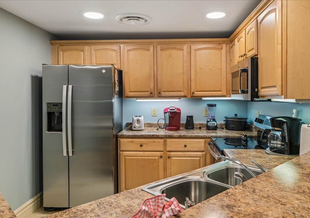 Your fully-equipped kitchen awaits with granite counters, stainless appliances, and everything you need to create memorable meals during your stay.