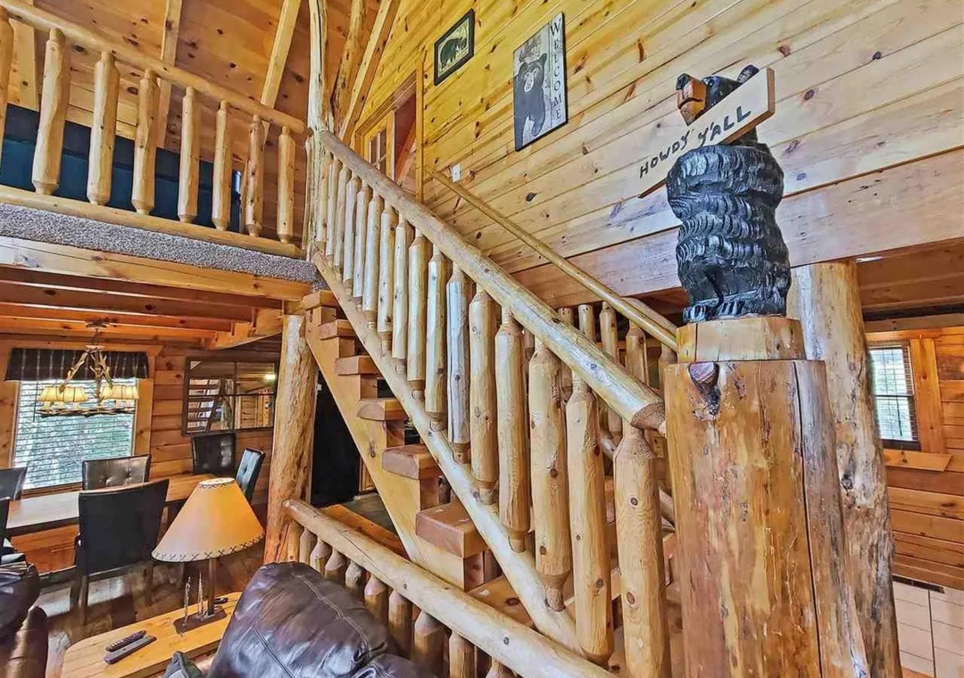 Step into rustic charm with hand-crafted log railings and authentic wilderness touches that make your cabin getaway feel perfectly authentic.