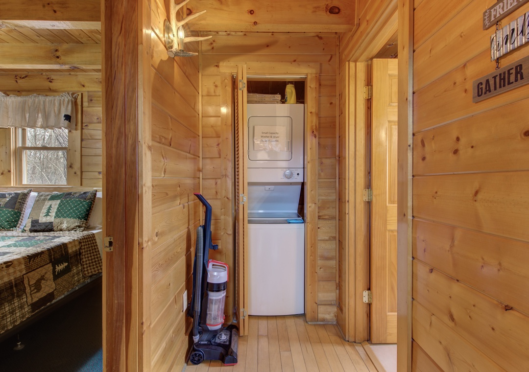 Your cozy cabin features a convenient stacked washer and dryer, making longer stays effortless with fresh linens always ready.