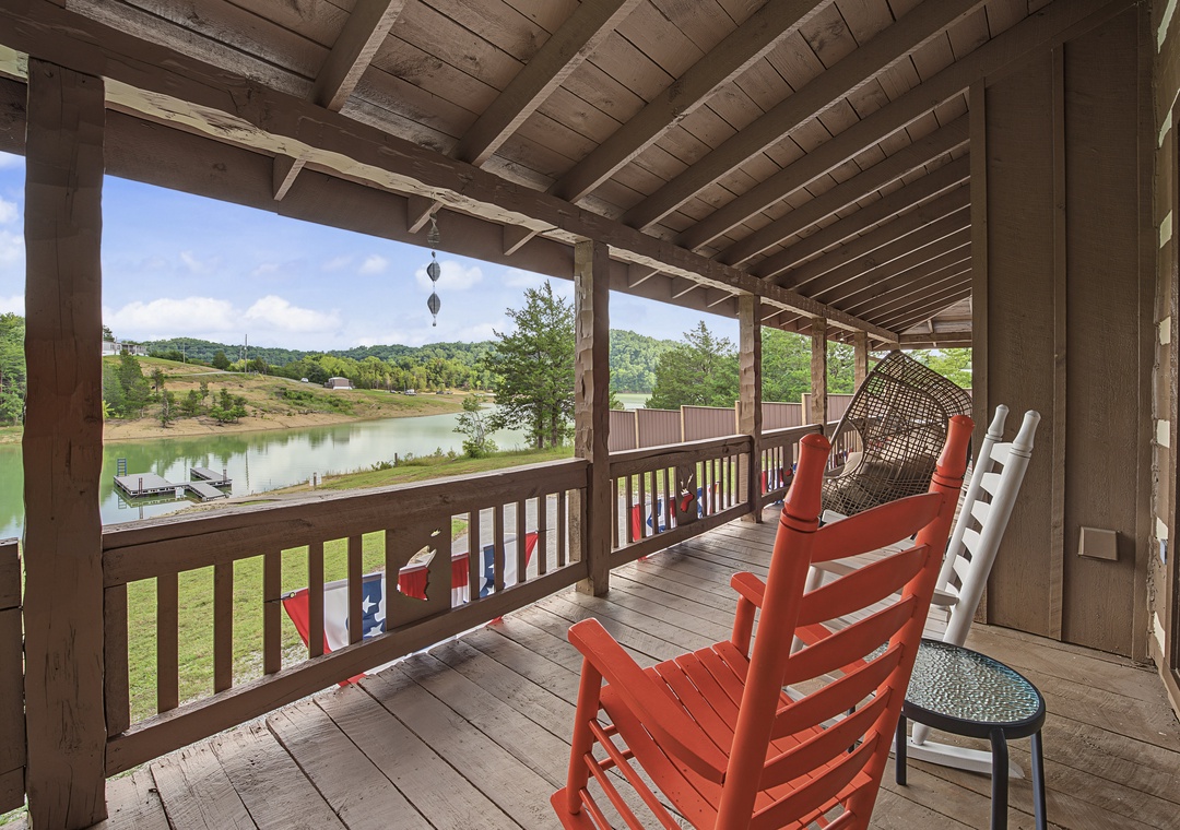 Picture yourself here: your private lakefront balcony with cozy rocking chairs, a relaxing hanging seat, and breathtaking water views. Mornings and evenings become pure magic as you unwind overlooking peaceful green hills.