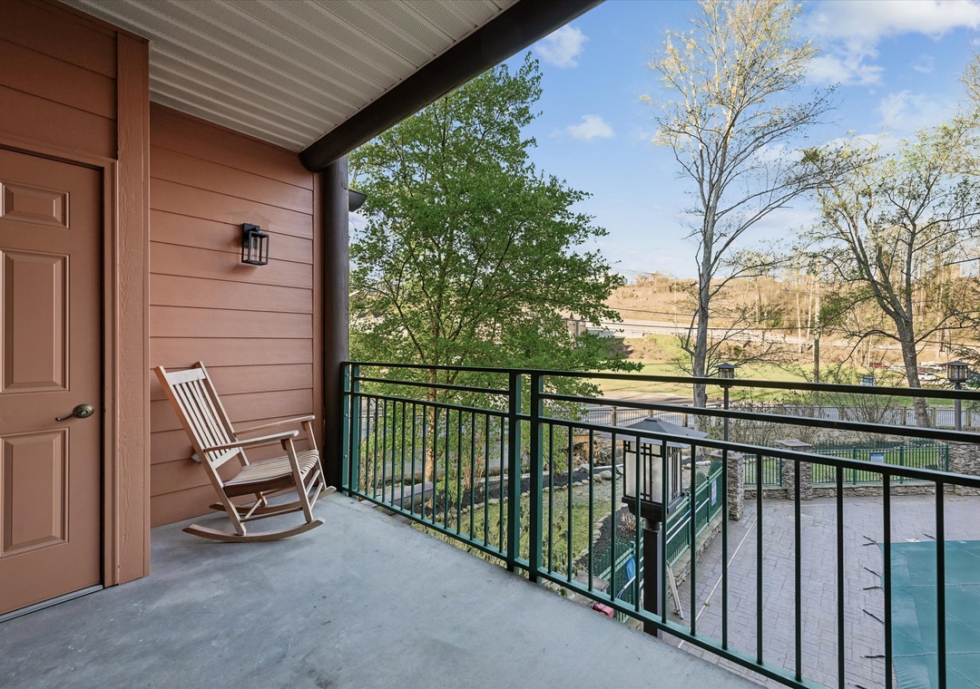 Rock gently on your private balcony while overlooking the pool and natural scenery below.