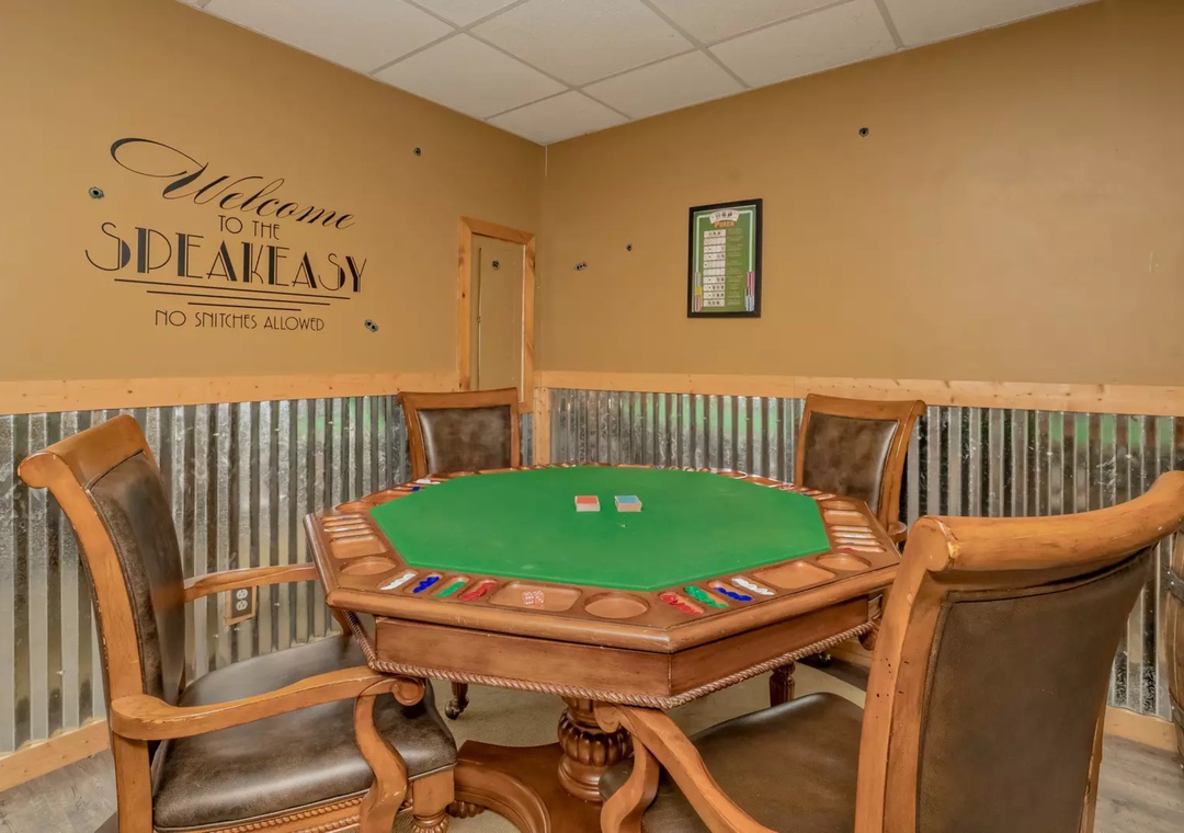 Step into your private speakeasy for card games and cocktails with friends in this elegant entertainment space.