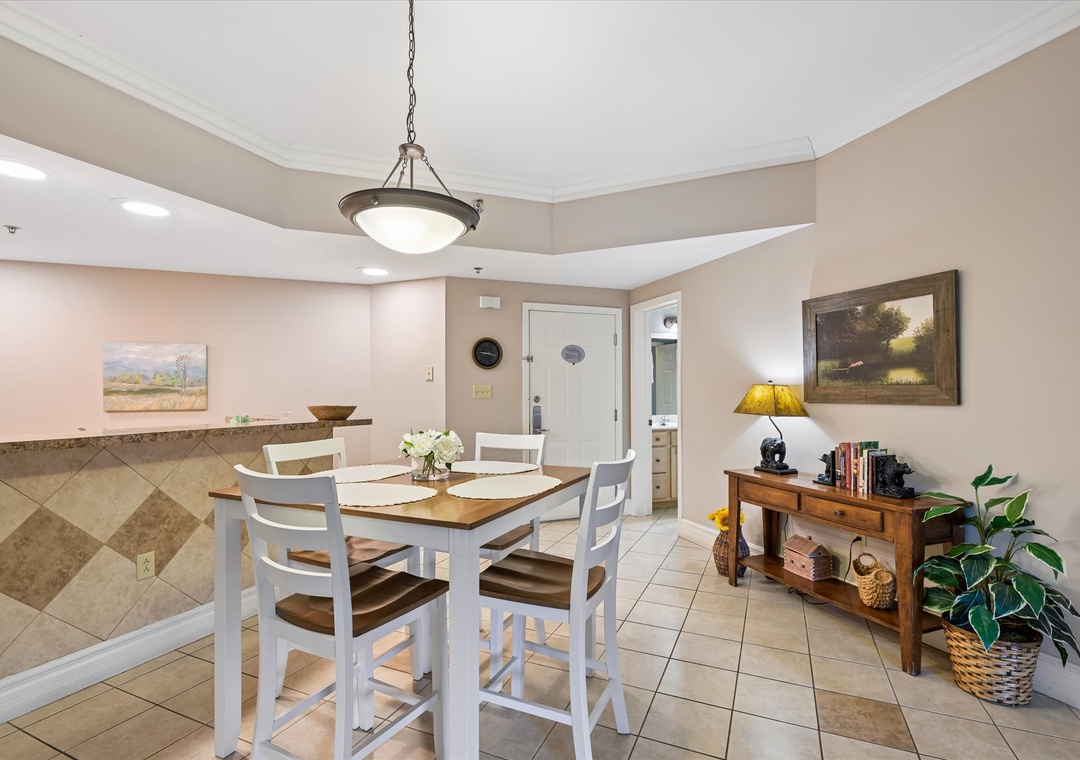 Gather around your dining table for memorable meals, with thoughtful touches and warm lighting creating the perfect atmosphere for conversation.