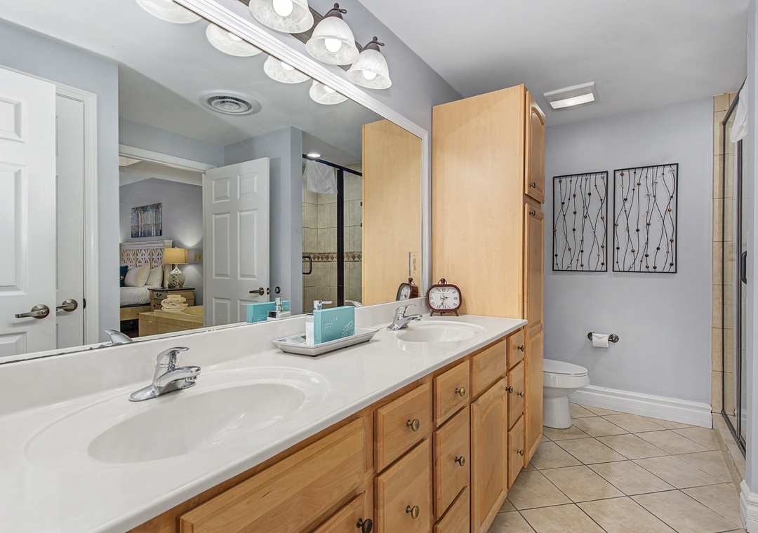 Your spacious master bathroom features dual vanities with plenty of storage, perfect for getting ready together each morning.