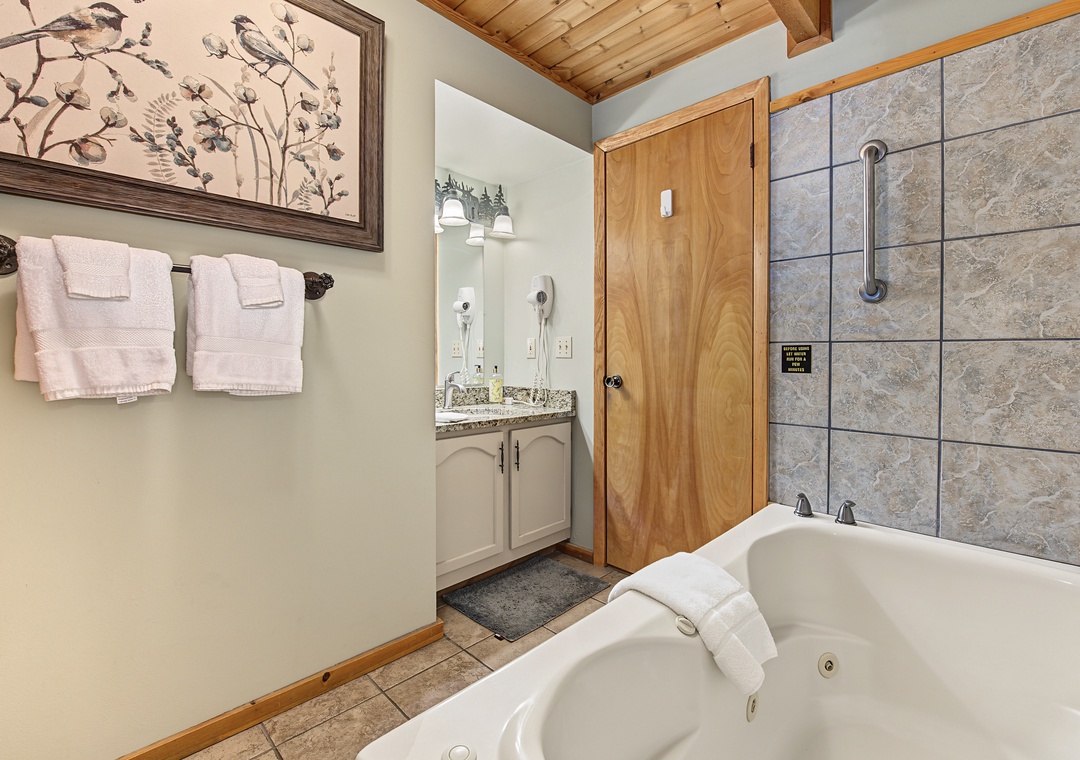 Soak your cares away in your private jetted tub, surrounded by warm wood accents and soft towels ready for you.