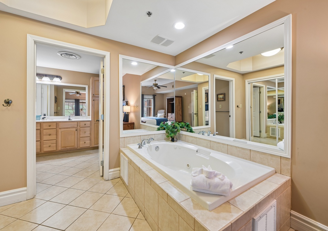 Unwind in your luxurious ensuite with a deep soaking tub and spacious vanity area, perfect for relaxation.