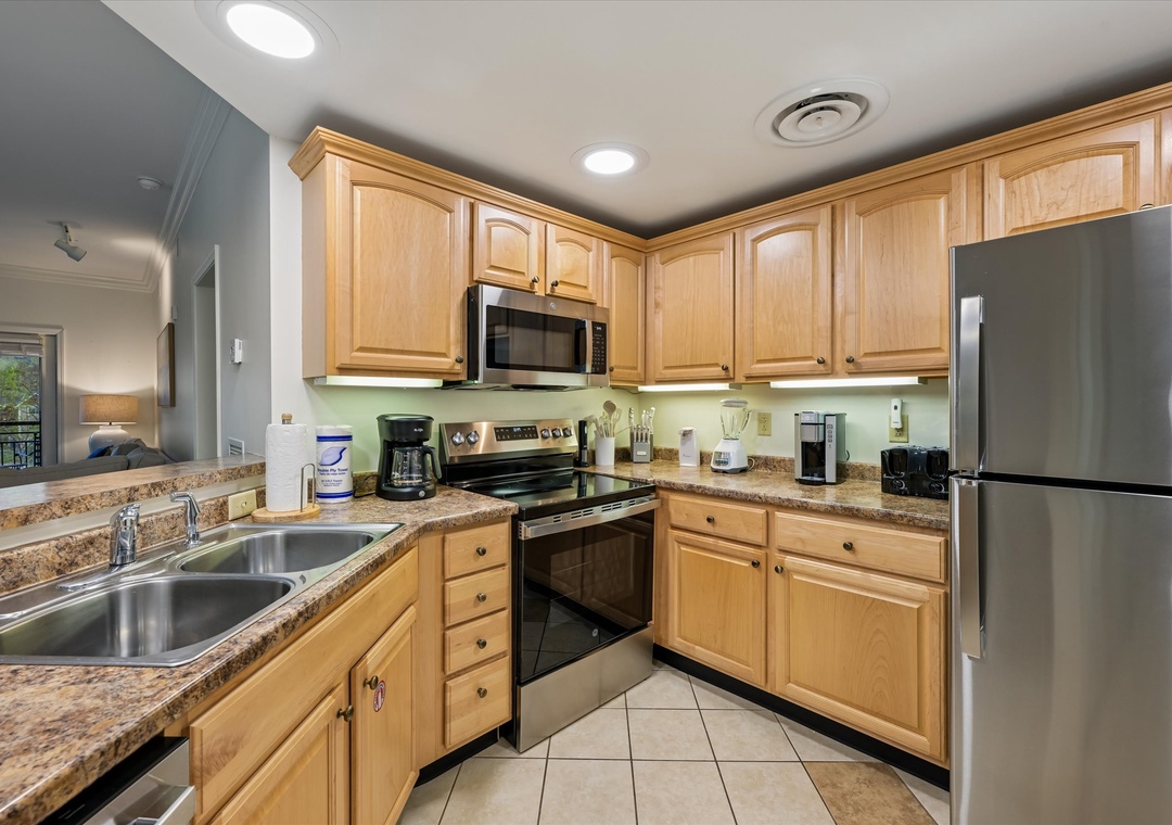 Your fully equipped kitchen features granite counters, stainless appliances, and plenty of cabinet space for your culinary adventures.