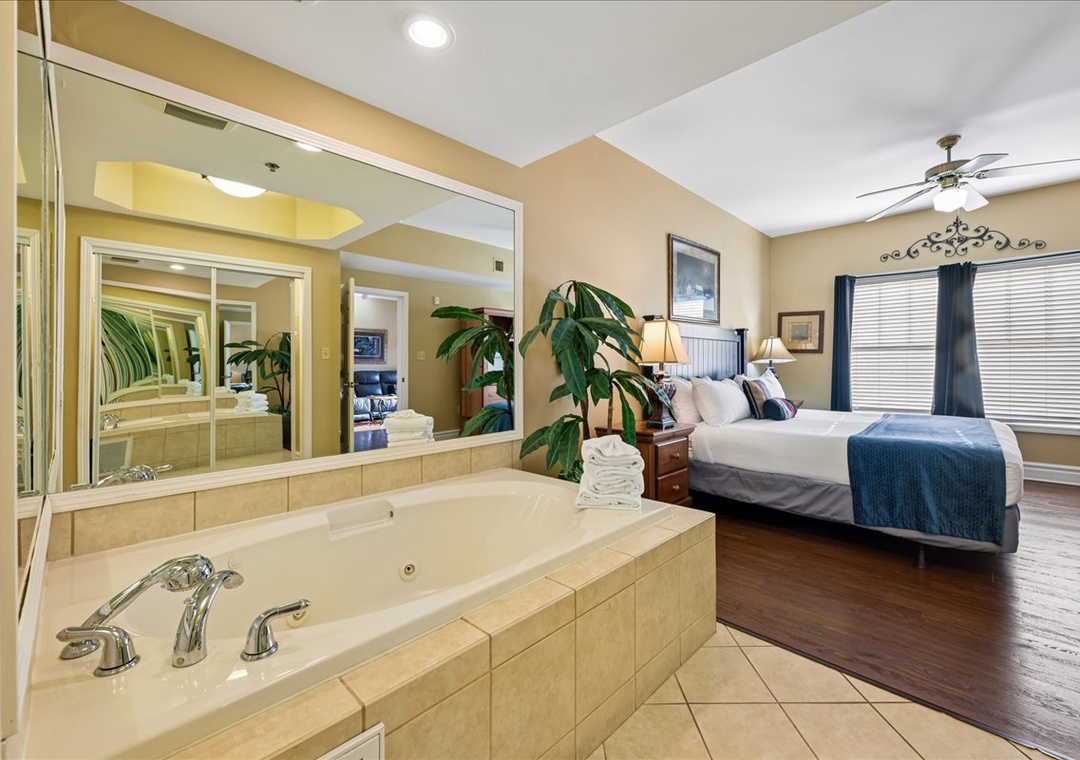 Unwind in your spacious suite featuring a luxurious jetted tub and king bed, where relaxation awaits after your adventures.