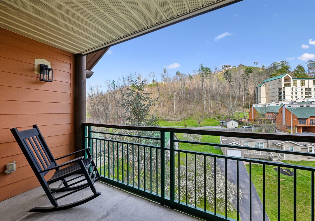 Relax in your private rocking chair on this covered balcony, enjoying peaceful mountain views and fresh air.
