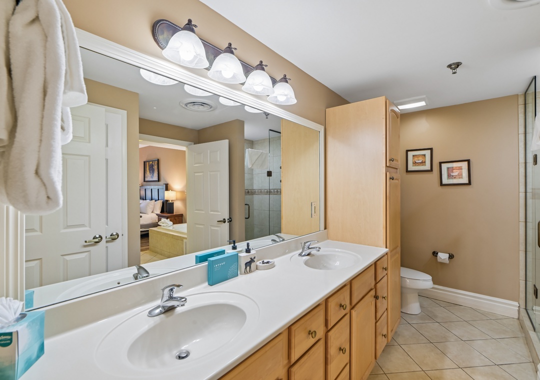 Refresh in your spacious bathroom with dual vanities, perfect for getting ready together. Ample storage and quality fixtures make this your private sanctuary.