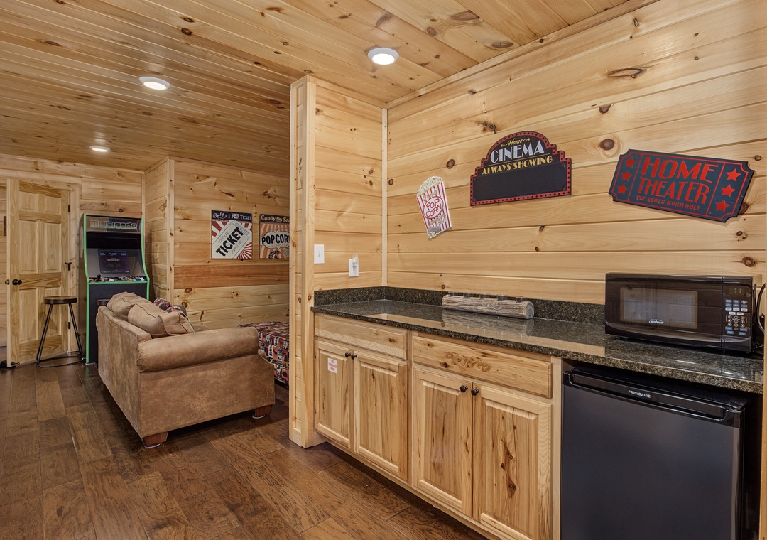 Warm wood details meet everything you need: cozy seating for downtime, a granite-topped kitchenette with microwave and mini-fridge, plus fun movie-themed decor to set the stage for your escape.