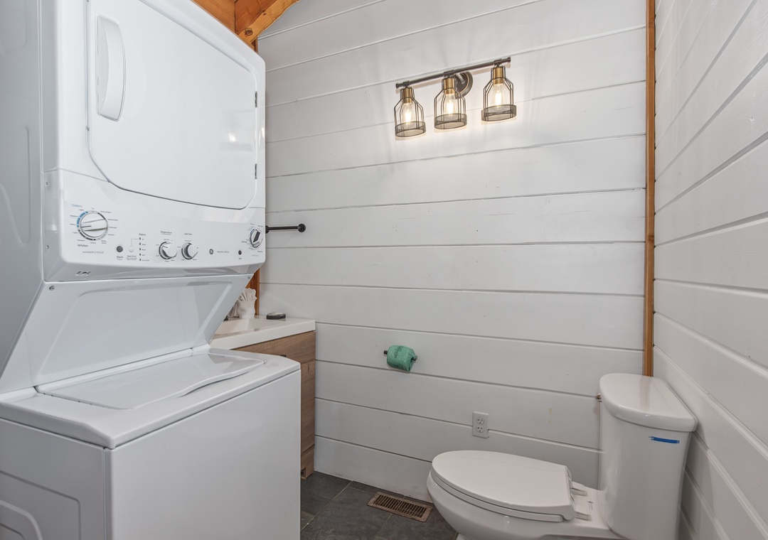 Your private bathroom features a convenient washer-dryer combo, so you can pack light and refresh your wardrobe anytime during your stay.
