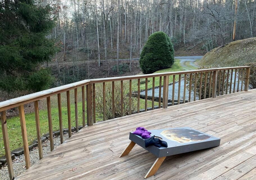 Unwind on your private deck overlooking serene forest views, where morning coffee feels magical surrounded by nature's tranquil beauty.