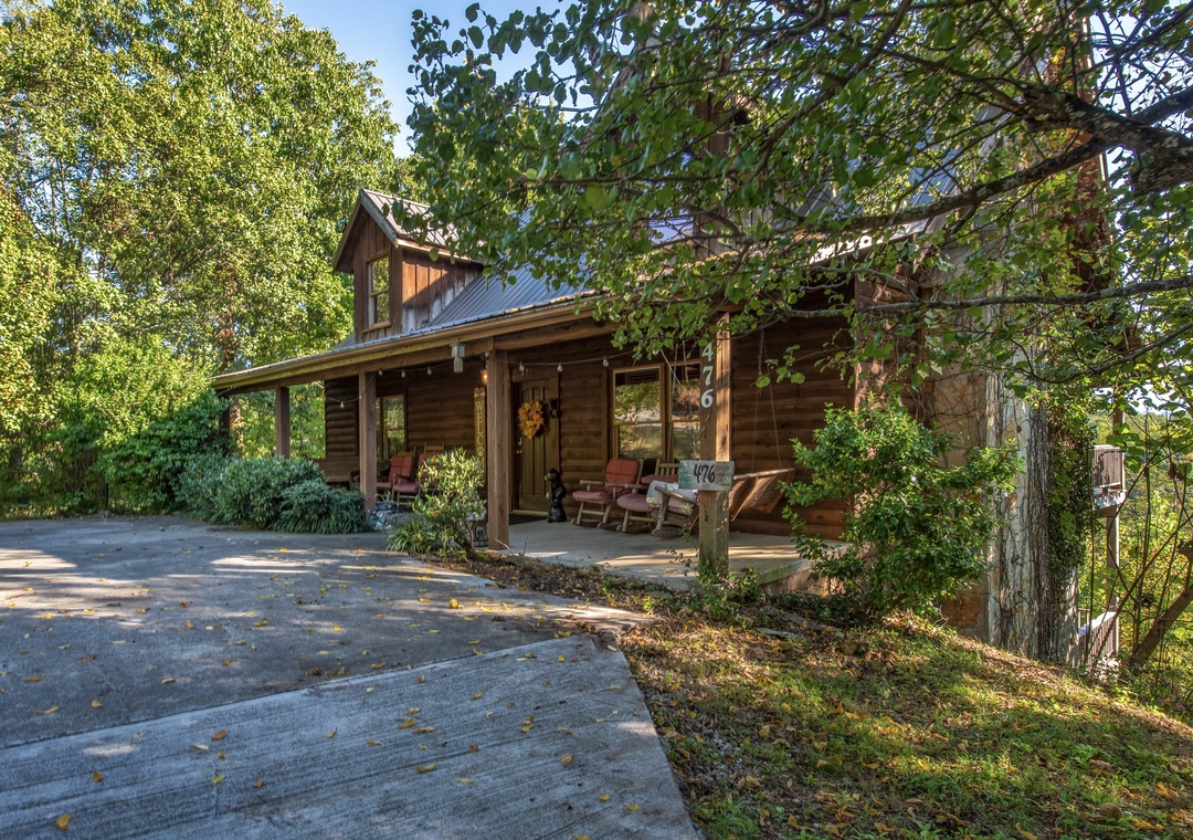 Nestled among towering trees, this charming log cabin awaits with a welcoming front porch and rustic warmth. Arrive to find peaceful seclusion and natural beauty surrounding your woodland retreat.