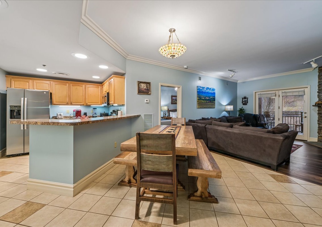 Relax in your spacious open-plan retreat where the gourmet kitchen flows into elegant dining and cozy living areas, perfect for gathering.