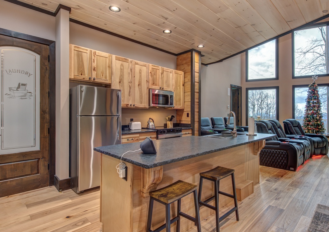 Your open kitchen flows seamlessly into the cozy living area, where granite countertops and modern appliances make cooking a joy.